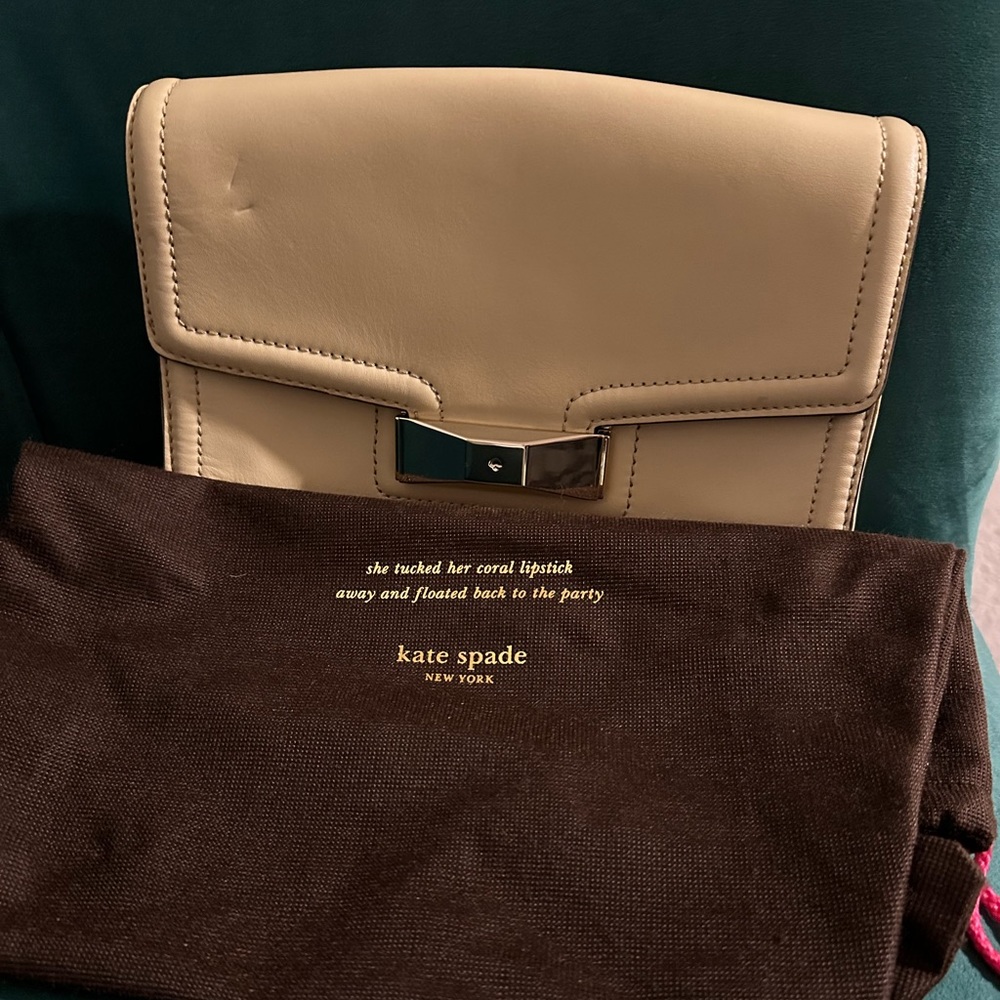 Vintage cream colored Kate Spade handbag with gold chain. NWOT.